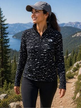 The North Face black and white camo pullover jacket, women’s size large.